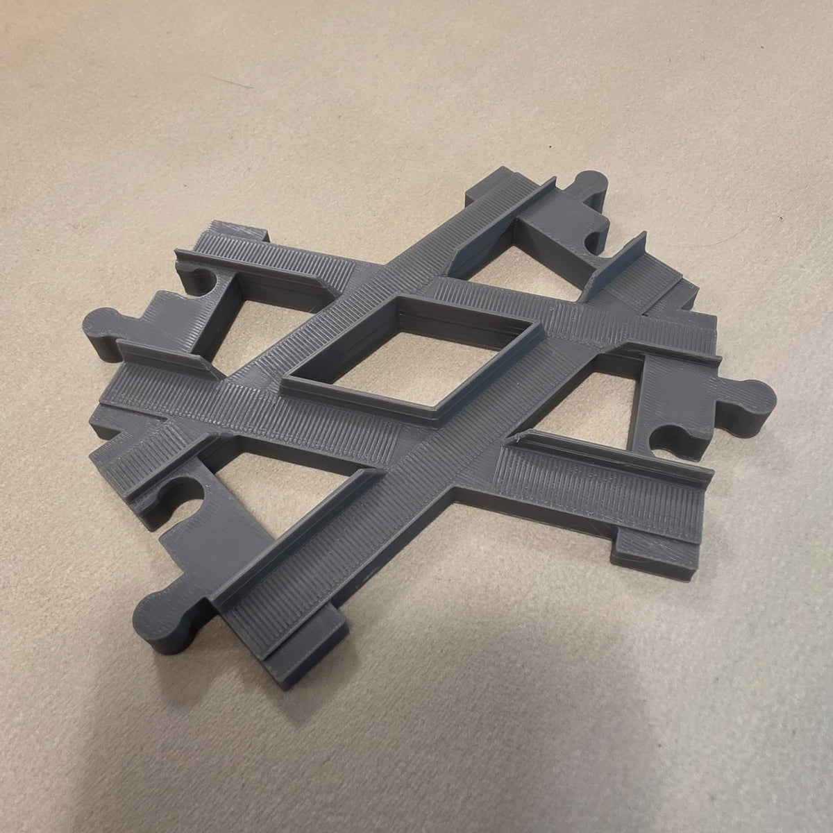Compatible DUPLO-style replacement train track piece