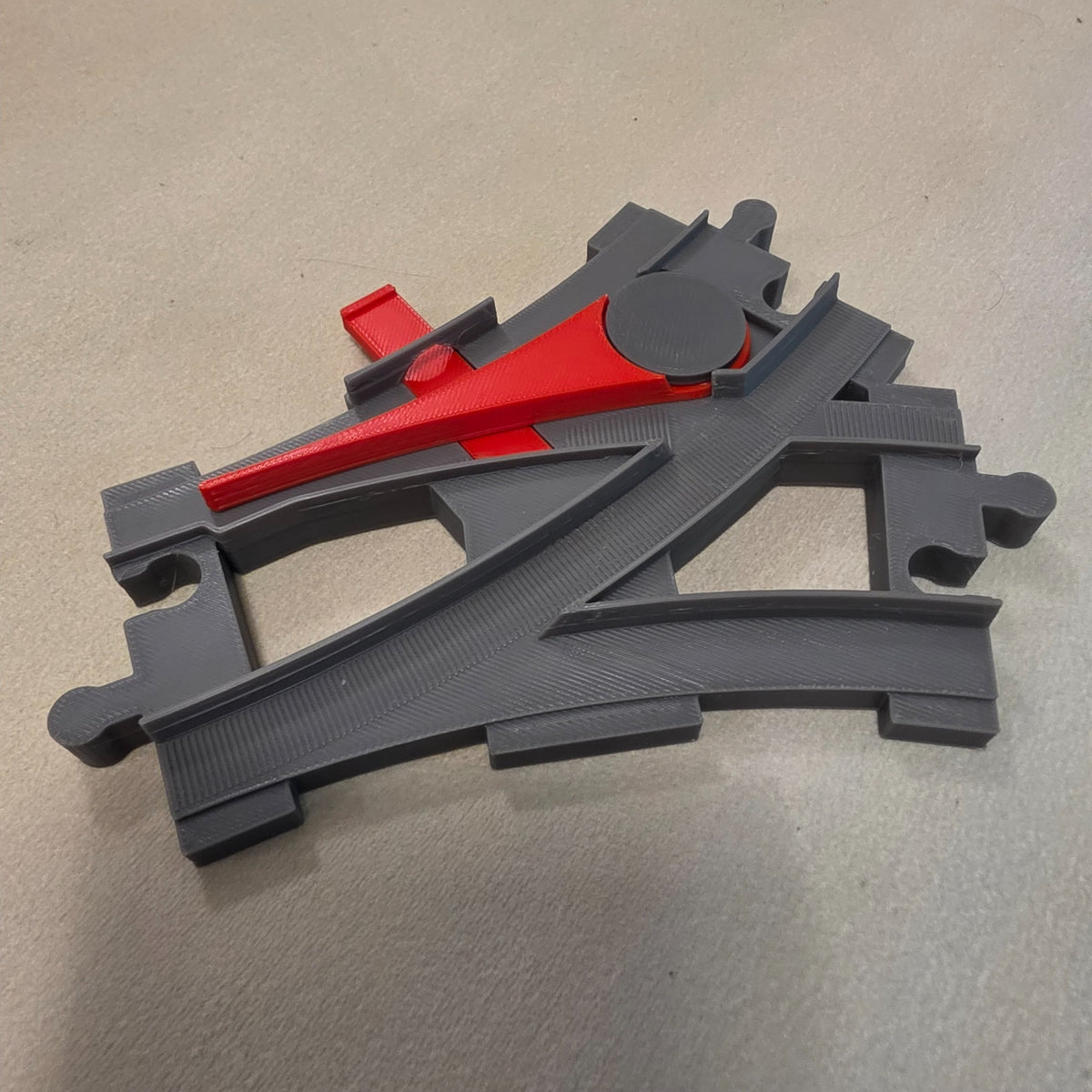 Compatible DUPLO-style replacement train track piece