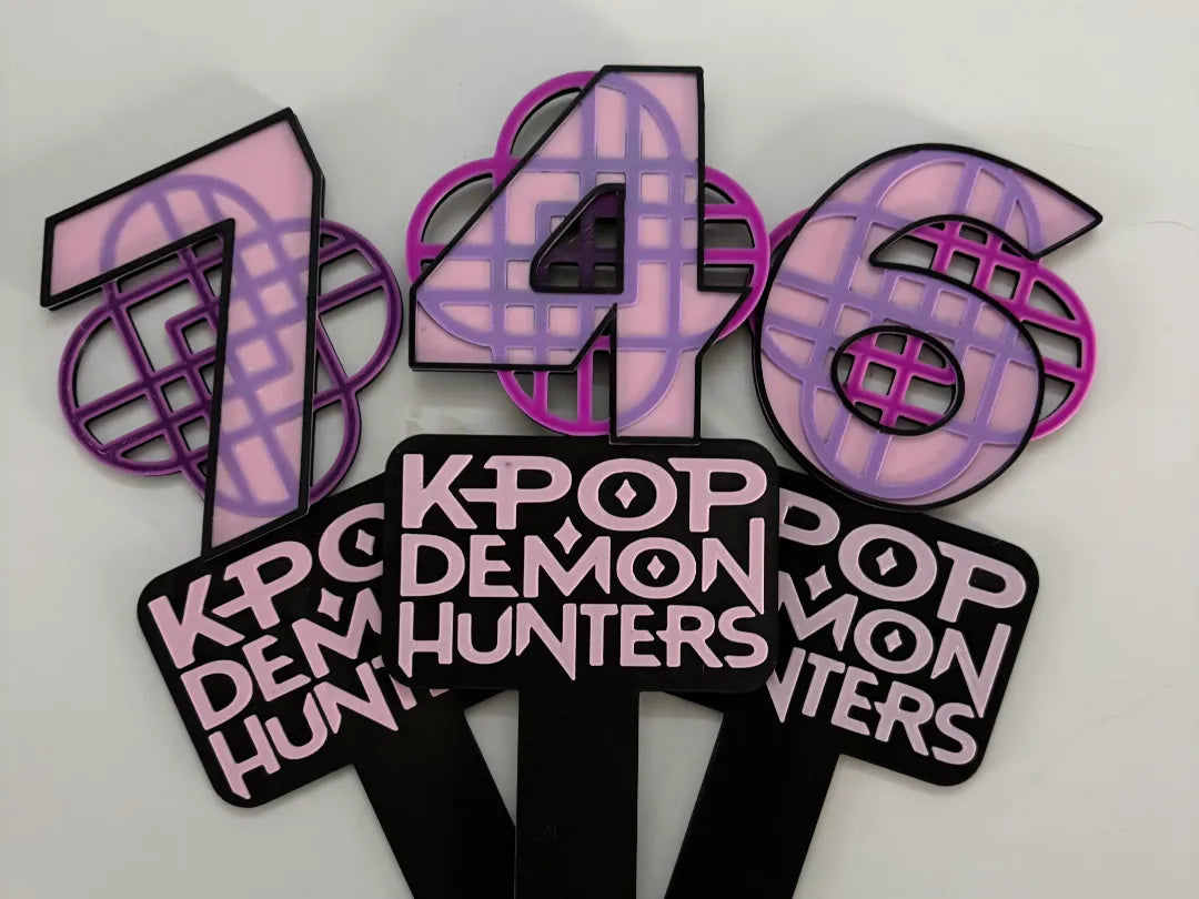 Huntrix birthday cake topper