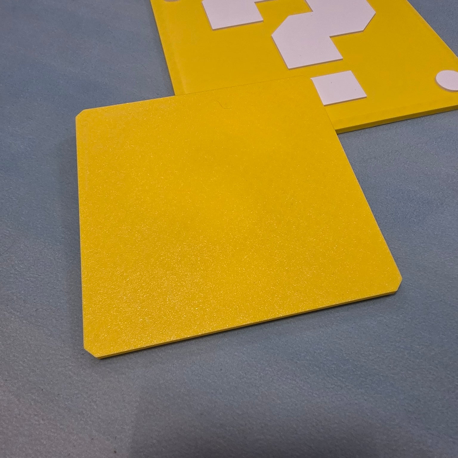 Back of yellow question block inspired 3D printed sign