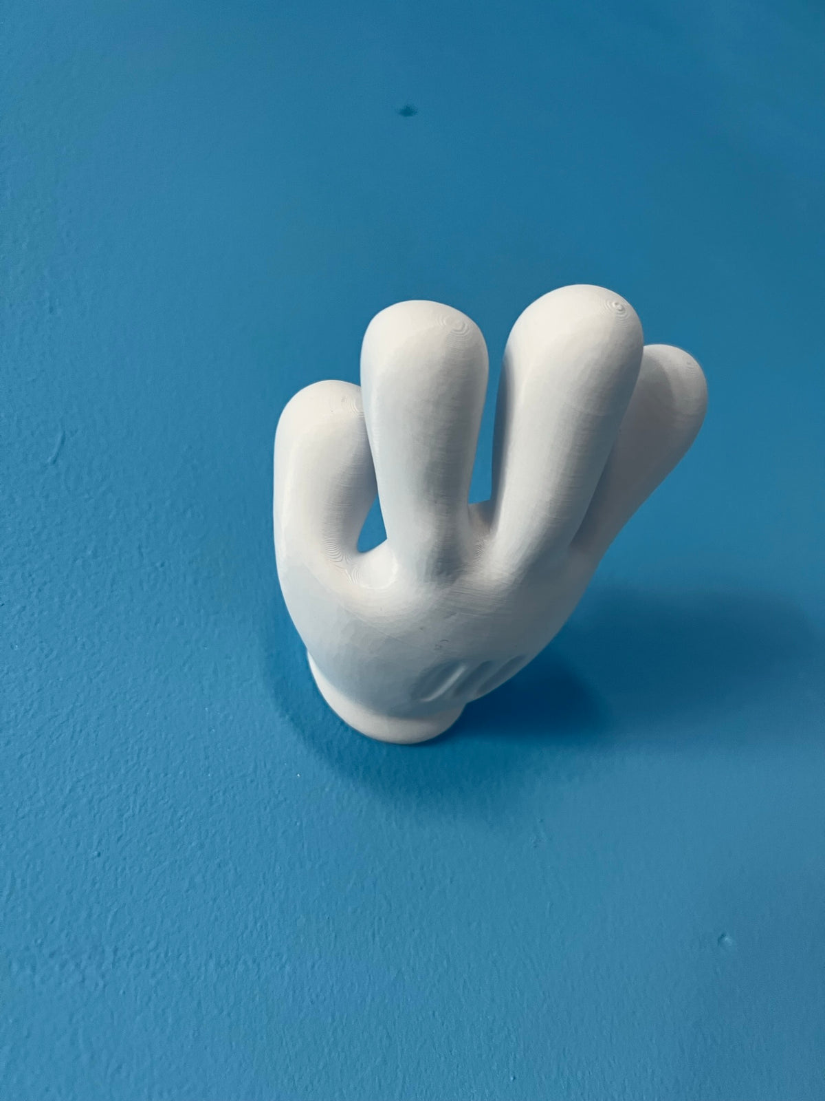 White Mickey hand wall hook front view