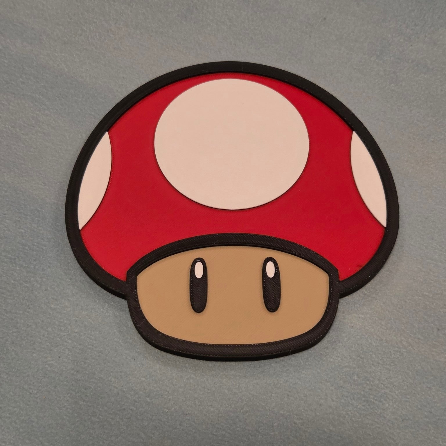 Red mushroom inspired 3D printed gaming wall sign