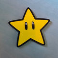 Super Mario star inspired 3D printed gaming wall sign