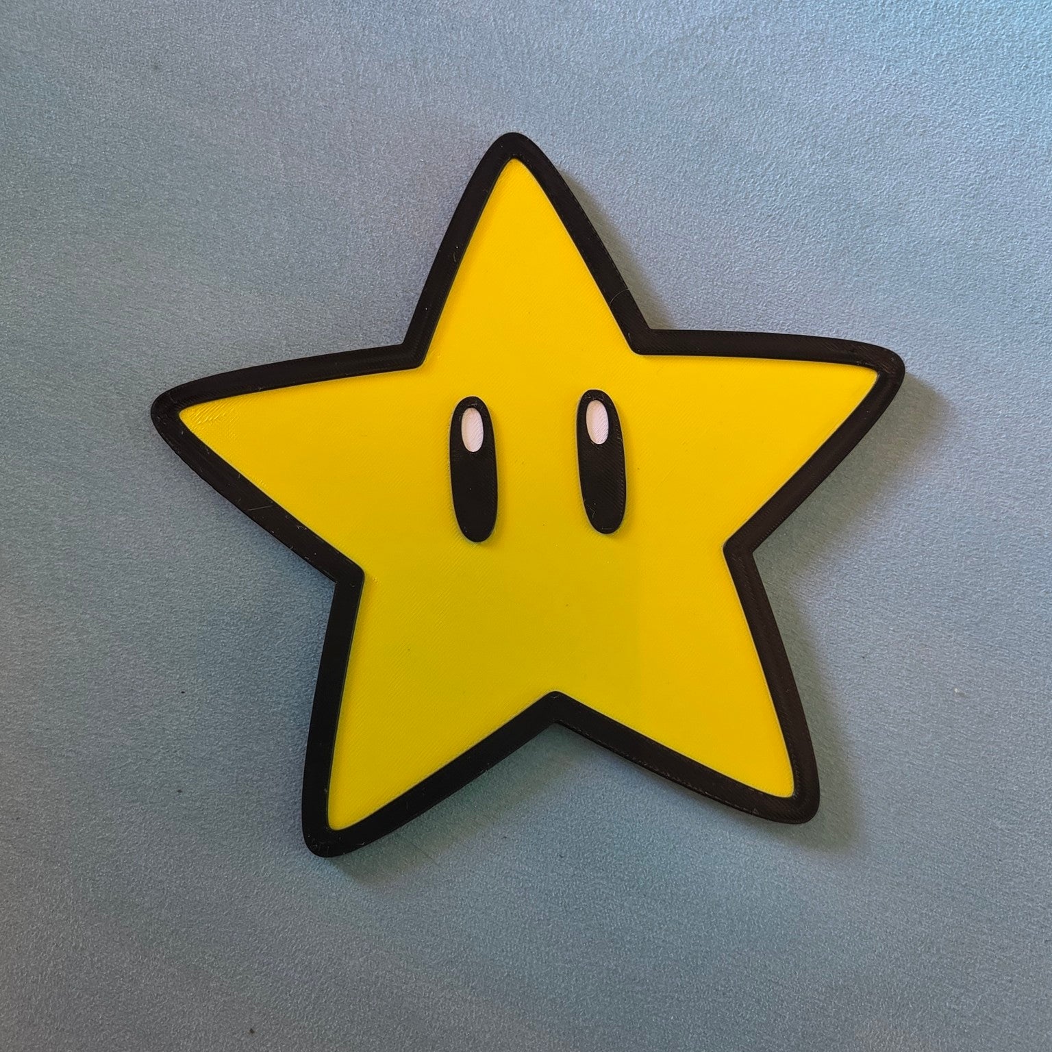 Super Mario star inspired 3D printed gaming wall sign