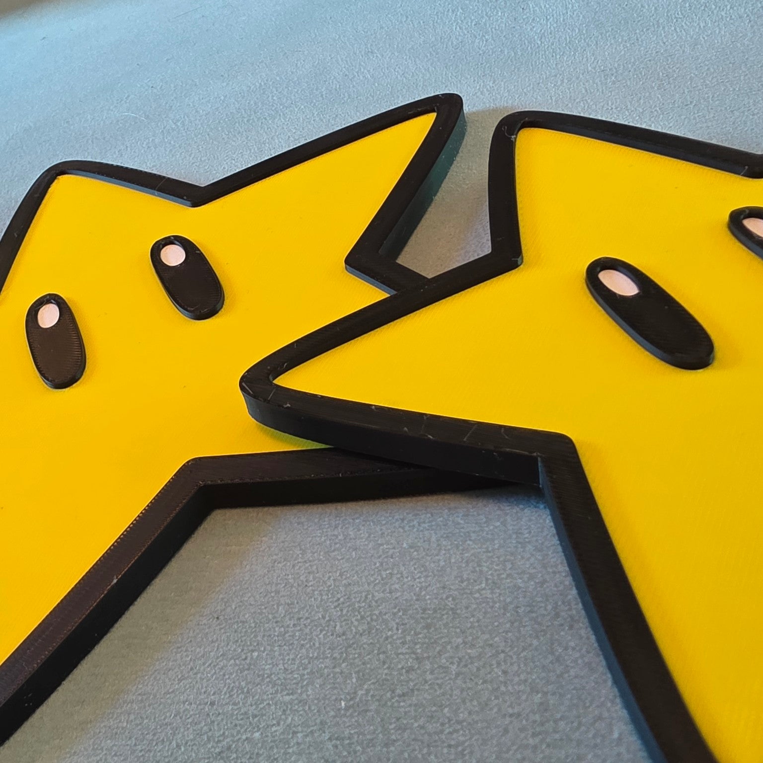 Close-up detail of Super Mario star inspired 3D printed wall decor