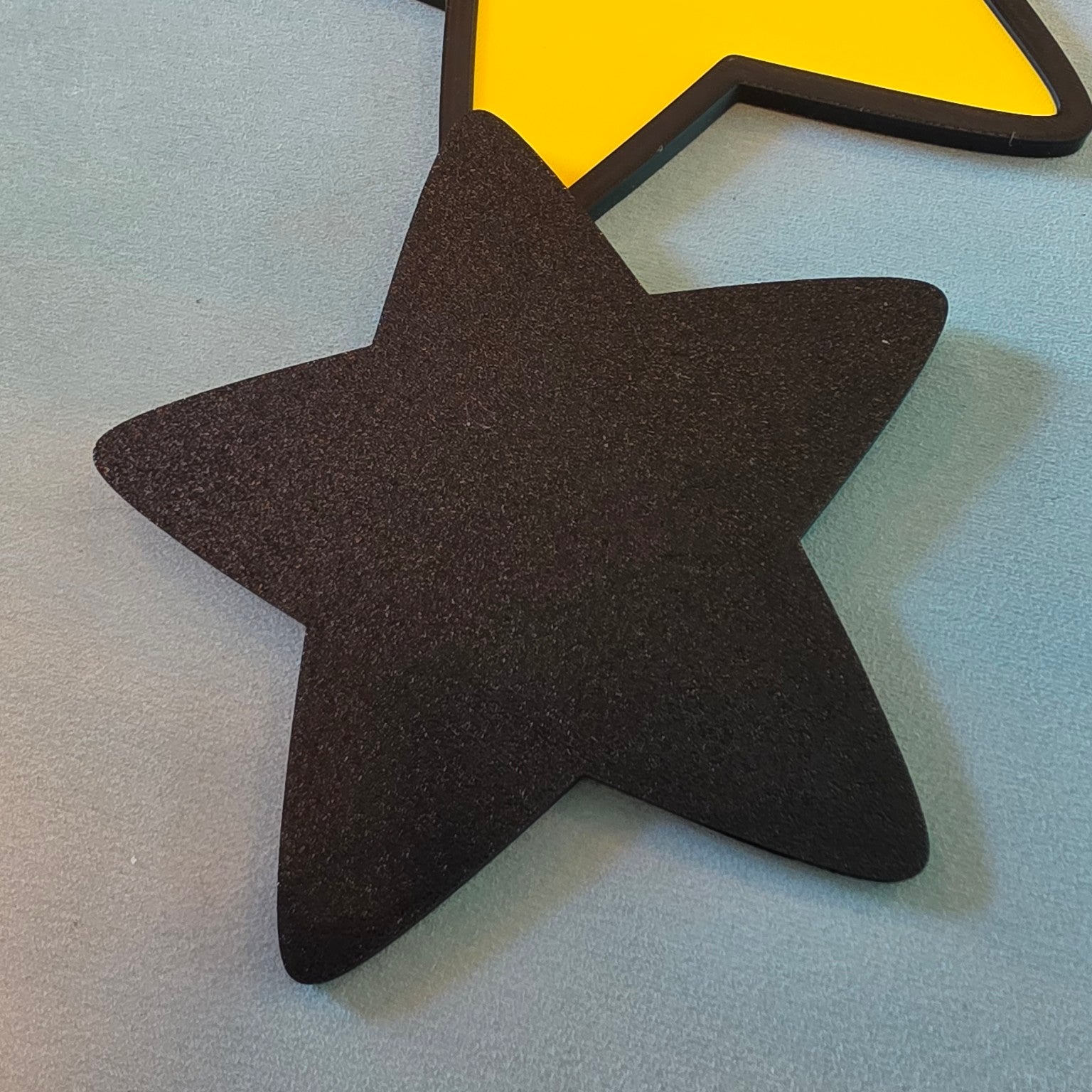Back view of Super Mario star inspired 3D printed gaming wall sign