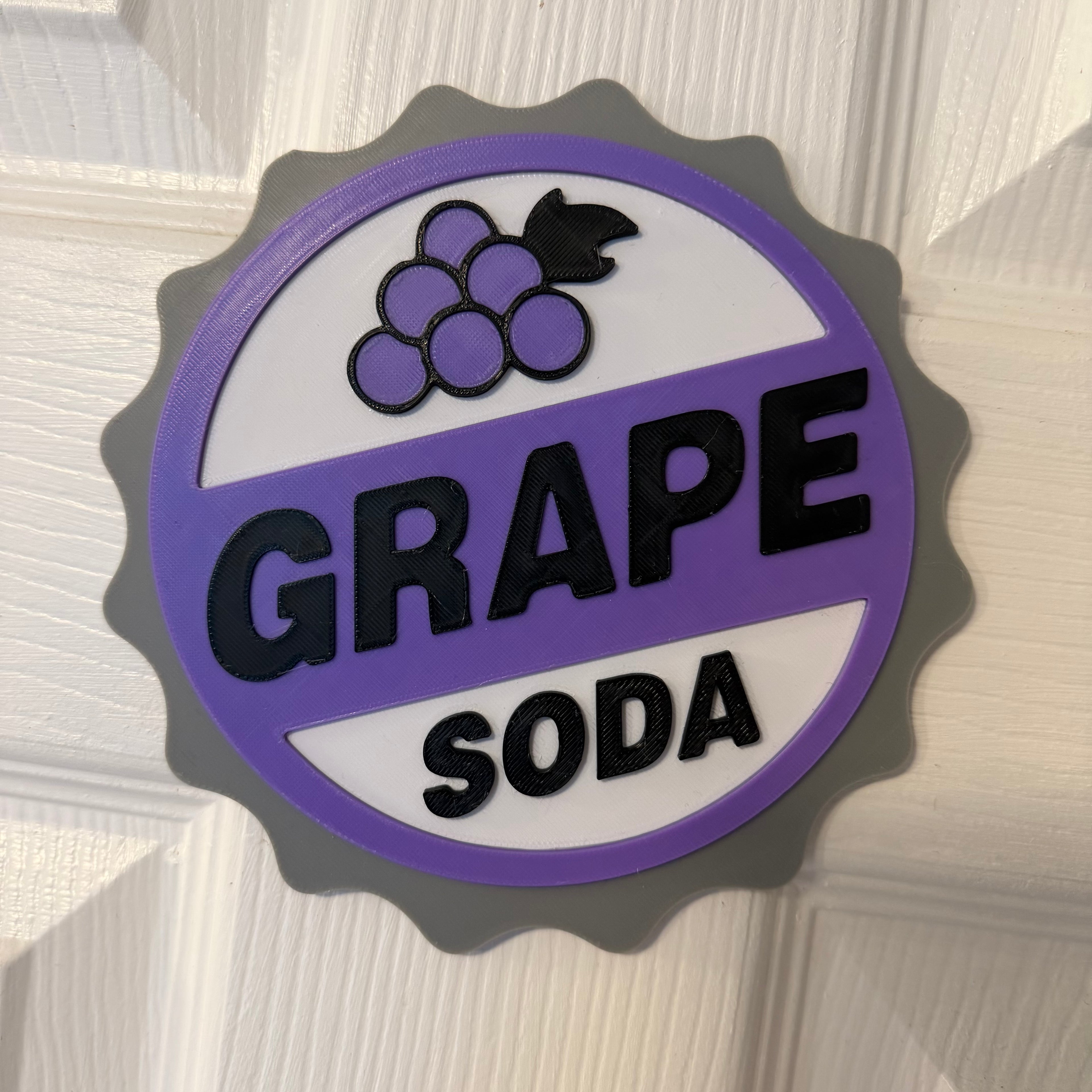 UP Grape Soda badge inspired 3D printed sign front view